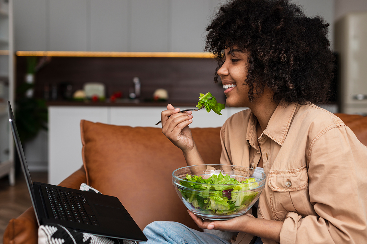 Healthy Eating Habits - lady eating a salad.